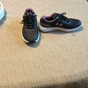 Under Armour sneakers.